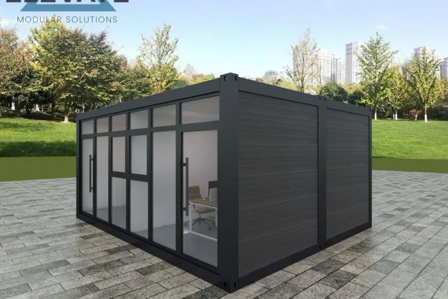 Corner view of modular unit with black wood-effect finish and full glass wall.