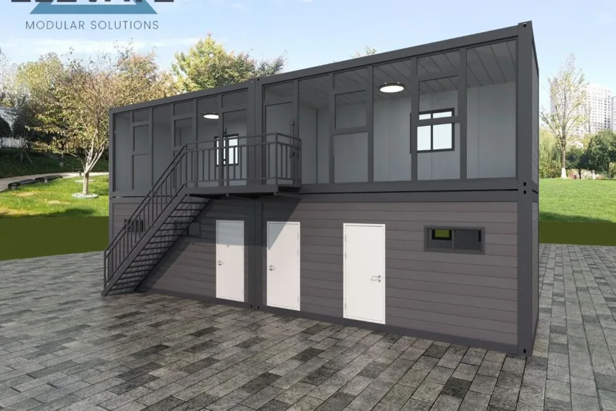 Two-storey modular building with external stairs and individual access doors.