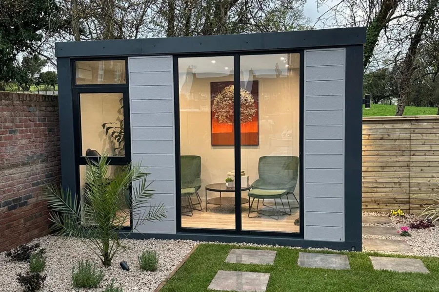 our 14x8ft garden room in a garden setting furnished to be a relaxation spot